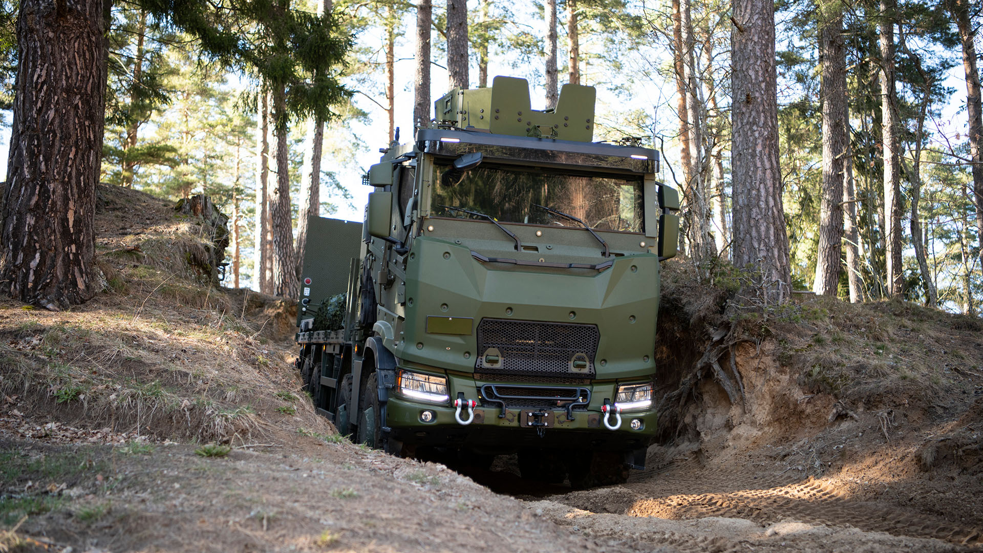 Scania R 500 protected cab, 8x8 flatbed with tail lift.
