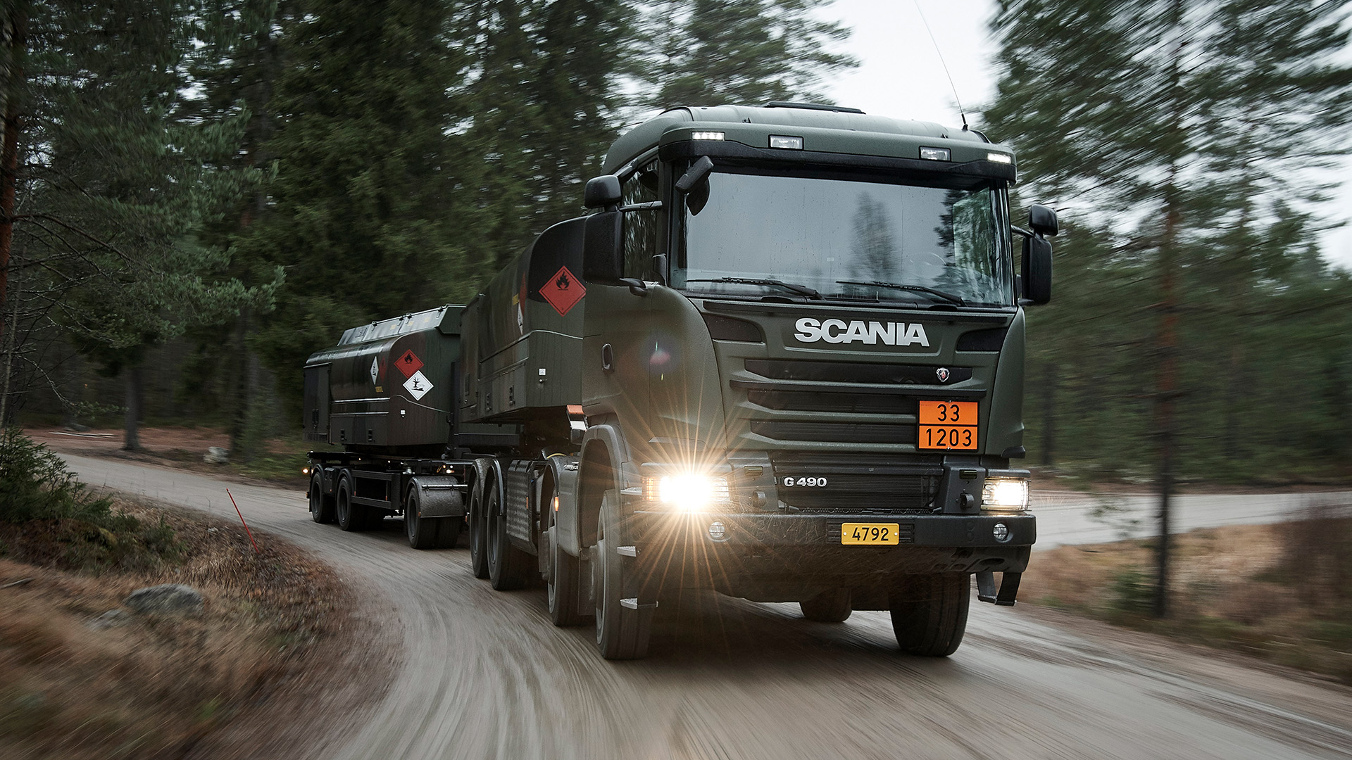 Scania G 490 8x6, hooklift with fuel container tanker.