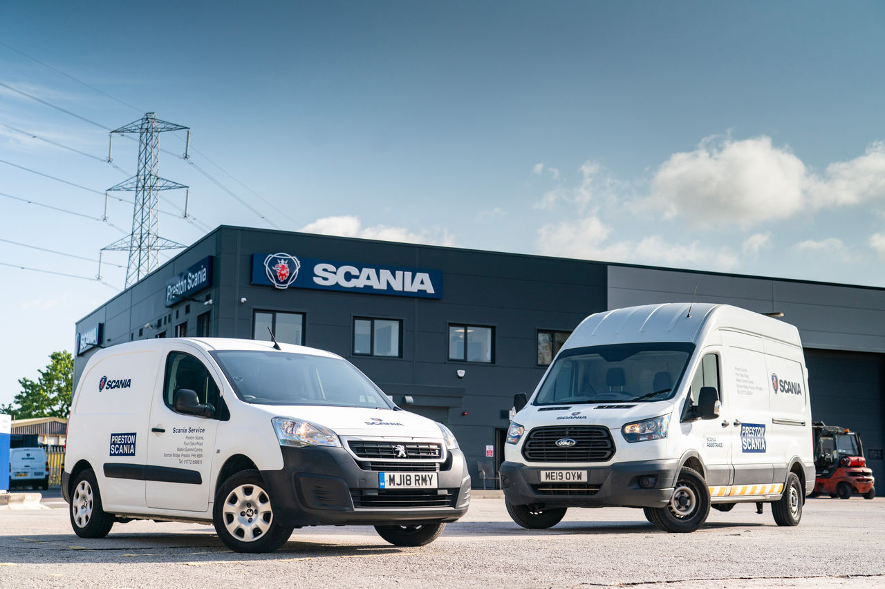 White vans parked in front of Scania branch