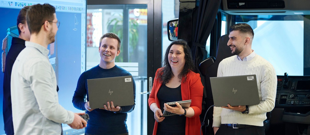 Scania colleague sat on sofa