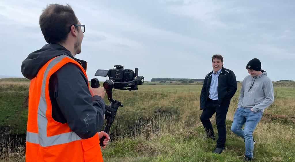 Father and son being filmed in Aberdeen