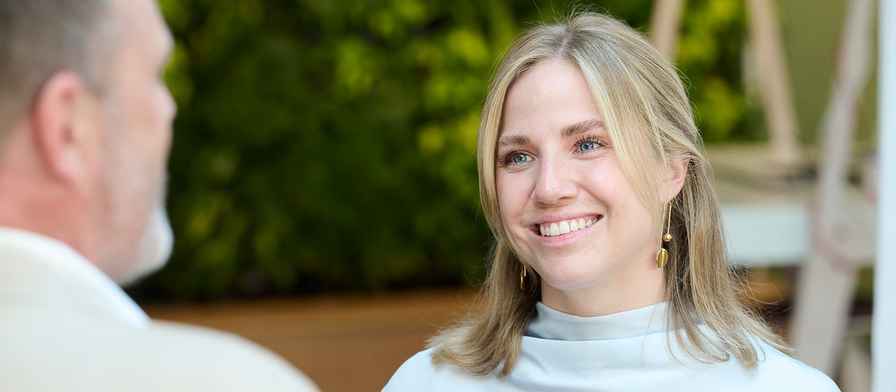 Woman and man talking