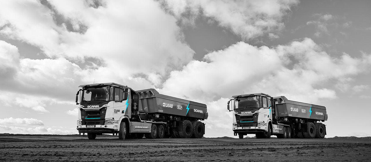 Two of Swedish state-owned mining company LKAB's new fully-electric Scania heavy tipper trucks that operate underground, beneath the northern Swedish town of Malmberget, hauling iron ore at a depth of 1,250 metres.